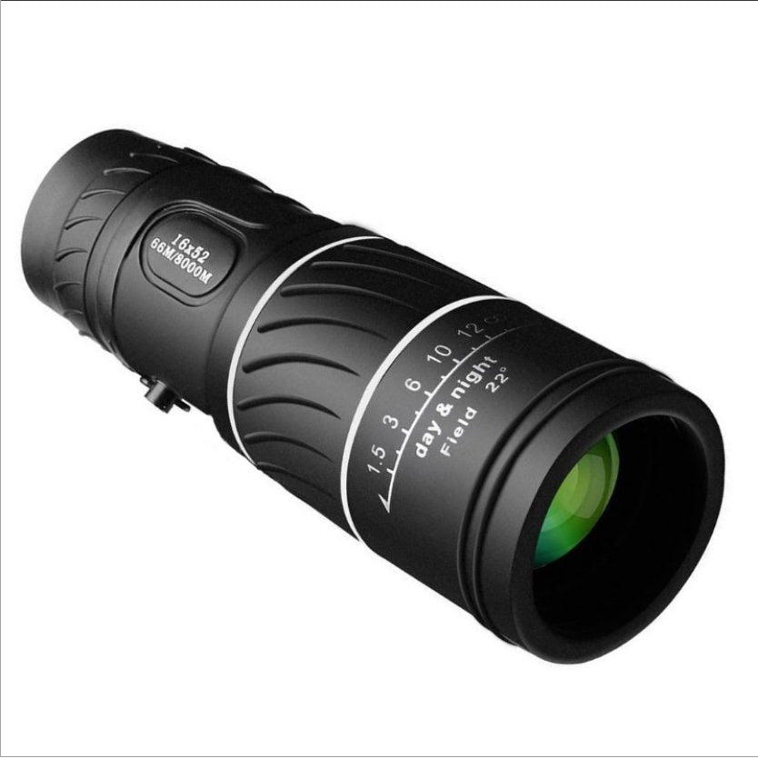 Black monocular telescope on a white background