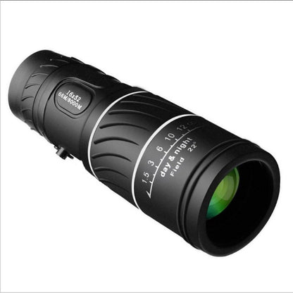 Black monocular telescope on a white background