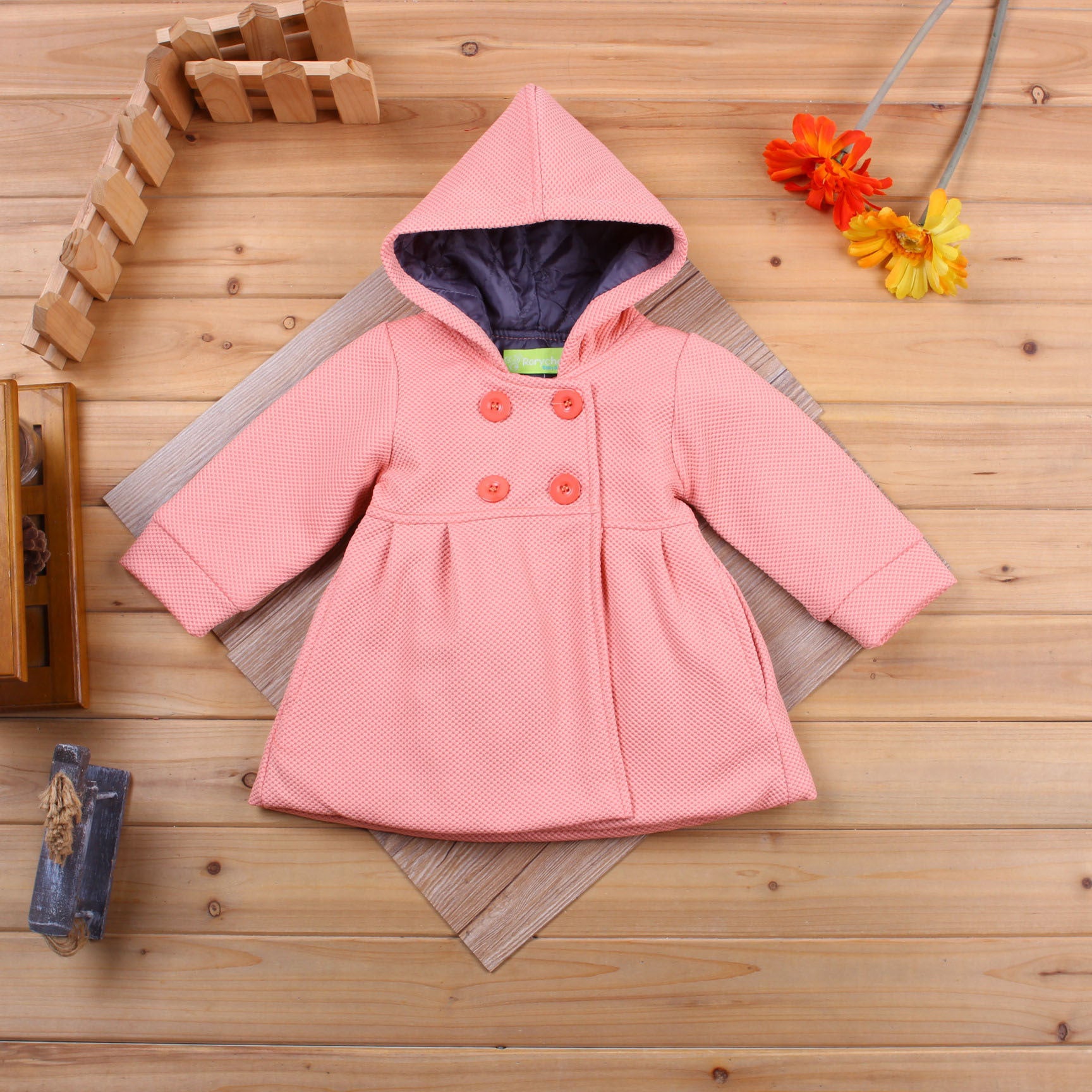 Girls hooded winter coat, pink with hood and flared A-line hem, buttoned double placket