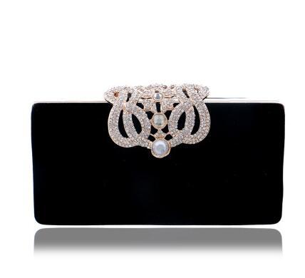 Rectangular black evening clutch with rhinestone ornate clasp and faux pearl