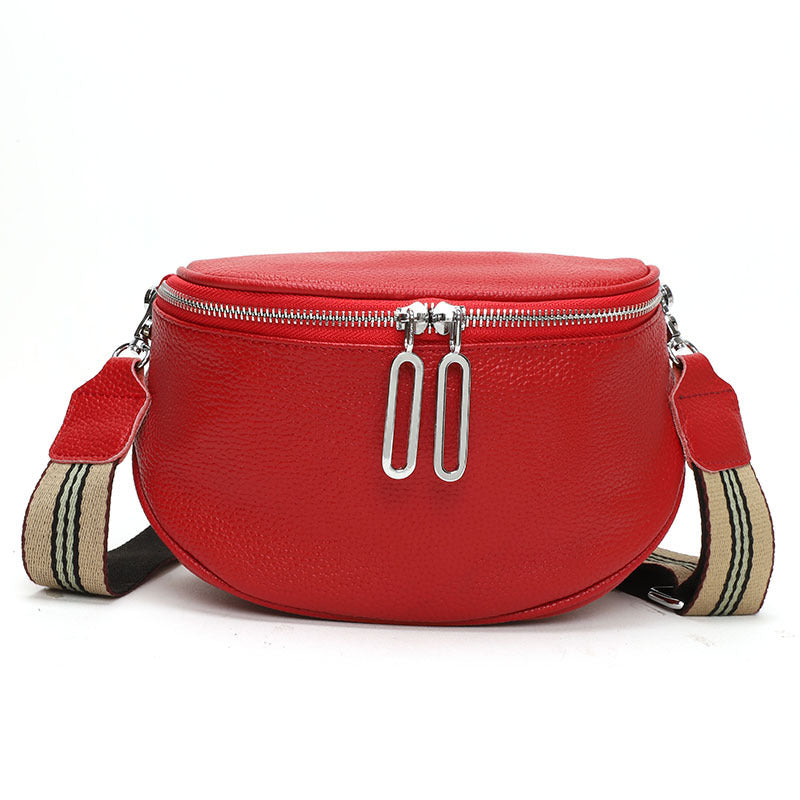Cowhide casual shoulder bag in red with double-zip pulls and striped webbing strap.
