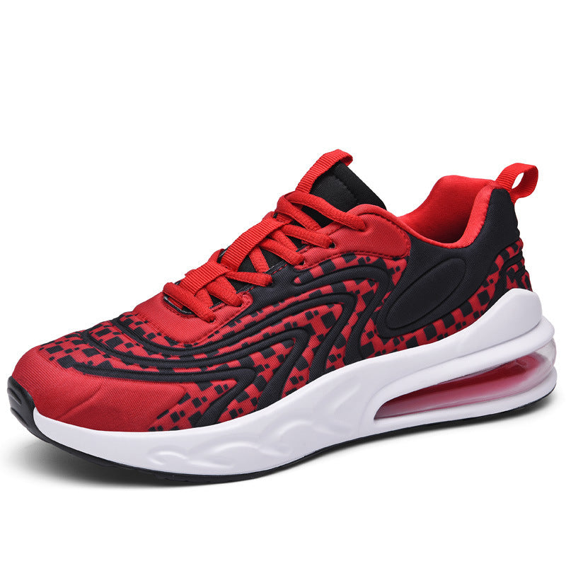 Red and black lace-up air cushion sneaker with white midsole and graphic tread