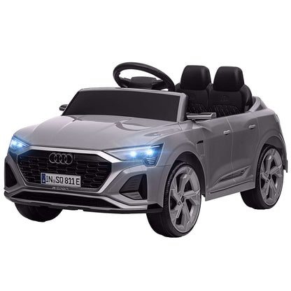 Gray kids ride-on car with open-top seats, black steering wheel, and LED headlights