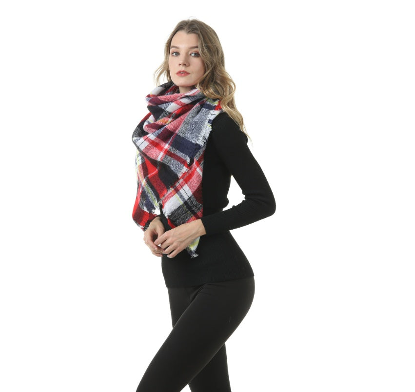 Red, black, and white plaid women’s scarf with multicolor lines and fringed ends