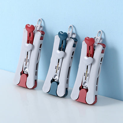 Travel folding hanger