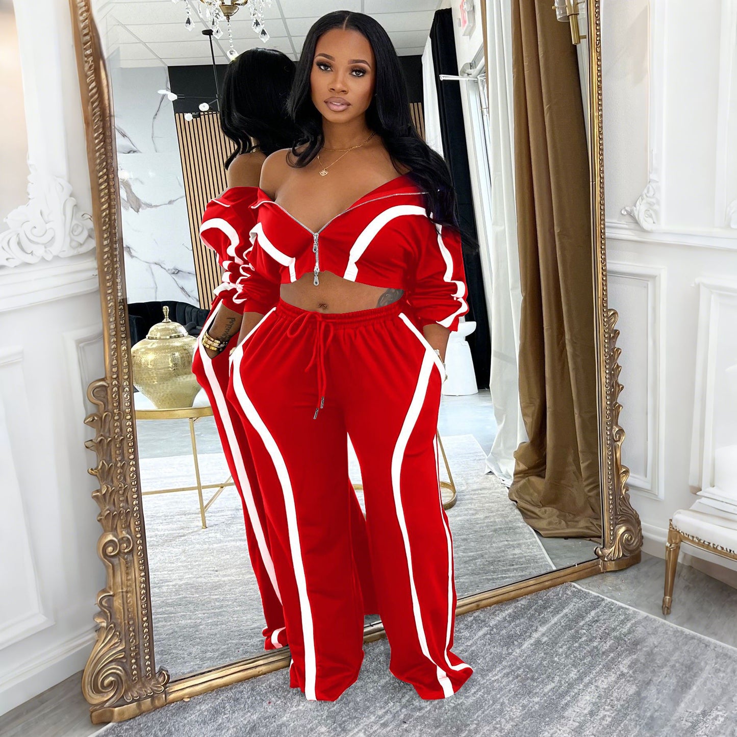 Contrast-striped two-piece cardigan set with off-shoulder cropped top and drawstring pants, red/white