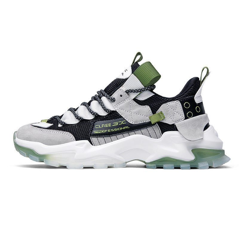Platform sneaker with black mesh upper, light green paneling, and white chunky sole.