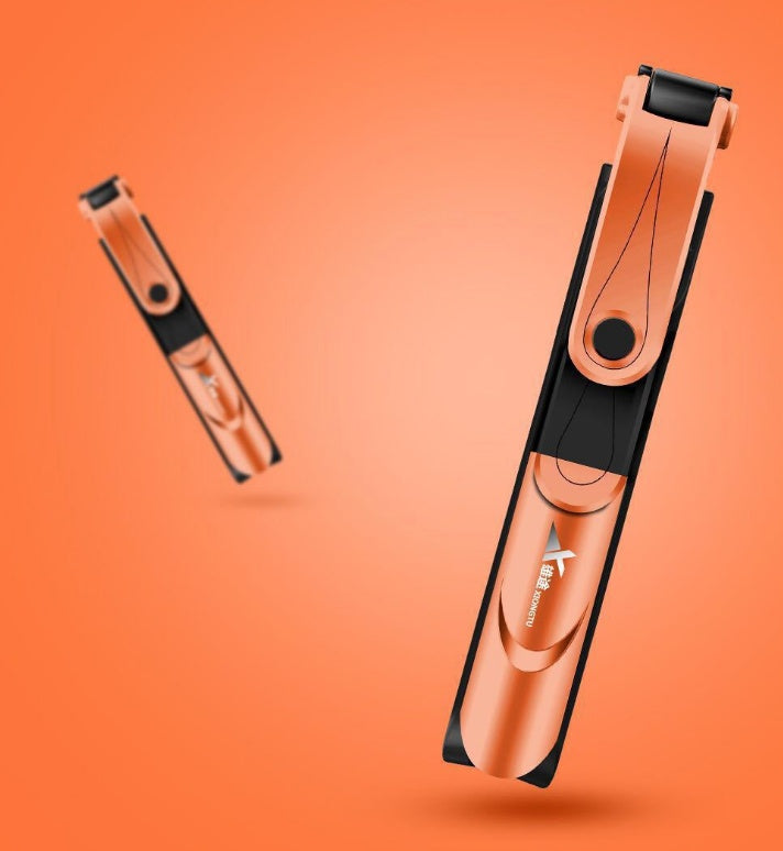 Orange and black selfie stick and tripod with phone holder clip