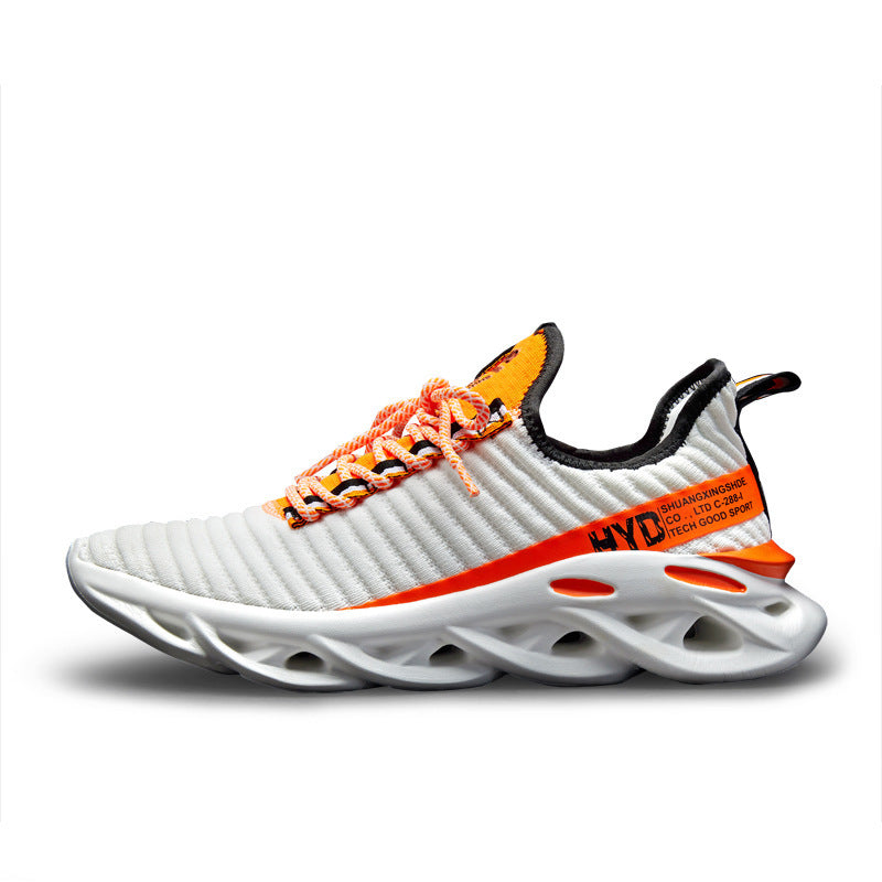 Men's breathable sneaker in white with orange laces, black collar, gray chunky sole