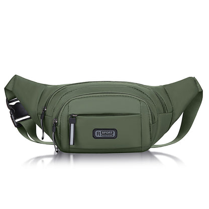 Green waist bag with central front pocket, top zipper, and adjustable strap