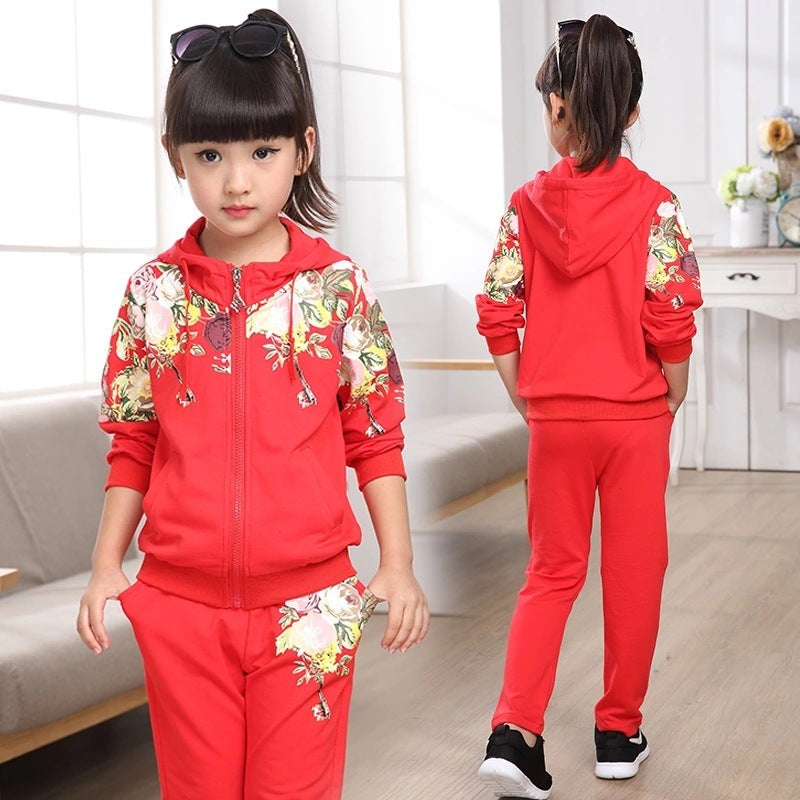 Red kids zip-up tracksuit set, front view with floral sleeves and matching pants