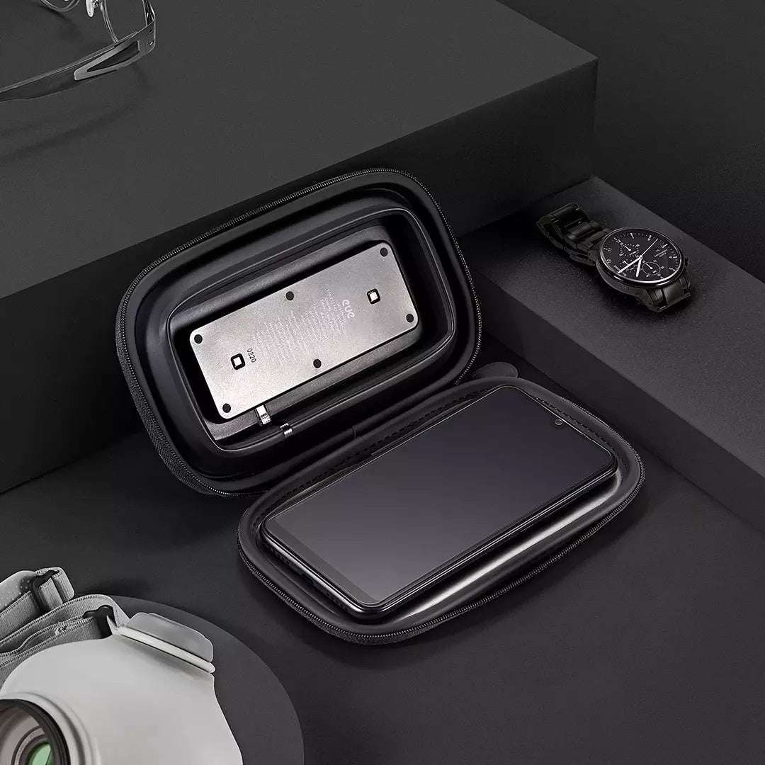 Black carrying case with electronic device on a dark surface