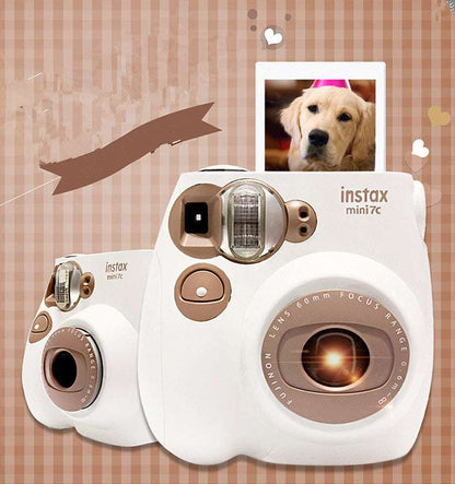 Instax camera with a photo of a dog on a checkered background