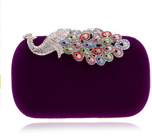 Purple velvet oval clutch with multicolor jewel floral fan clasp