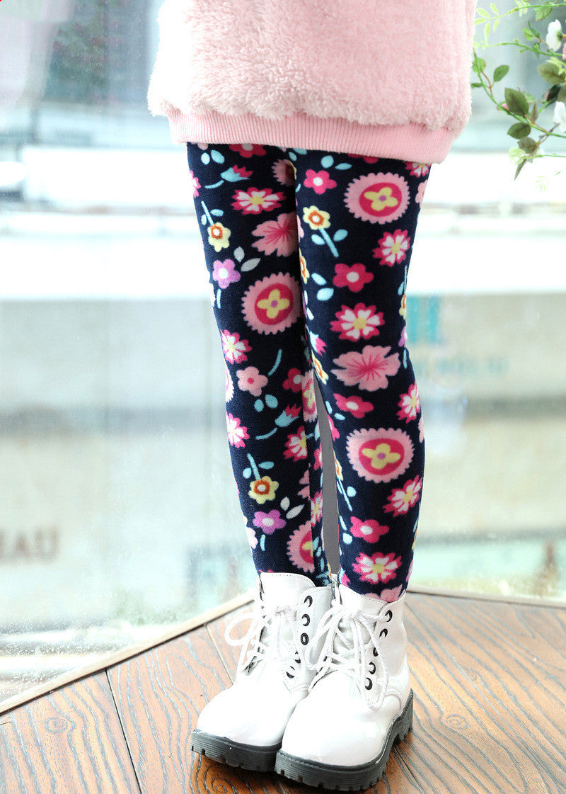 Girls' warm leggings in dark fabric with colorful flower print and straight cuffs