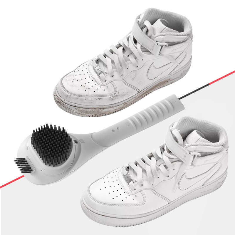 White sneakers with a cleaning tool on a white background