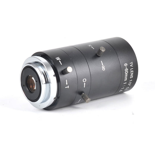 Camera lens with control knobs on a white background