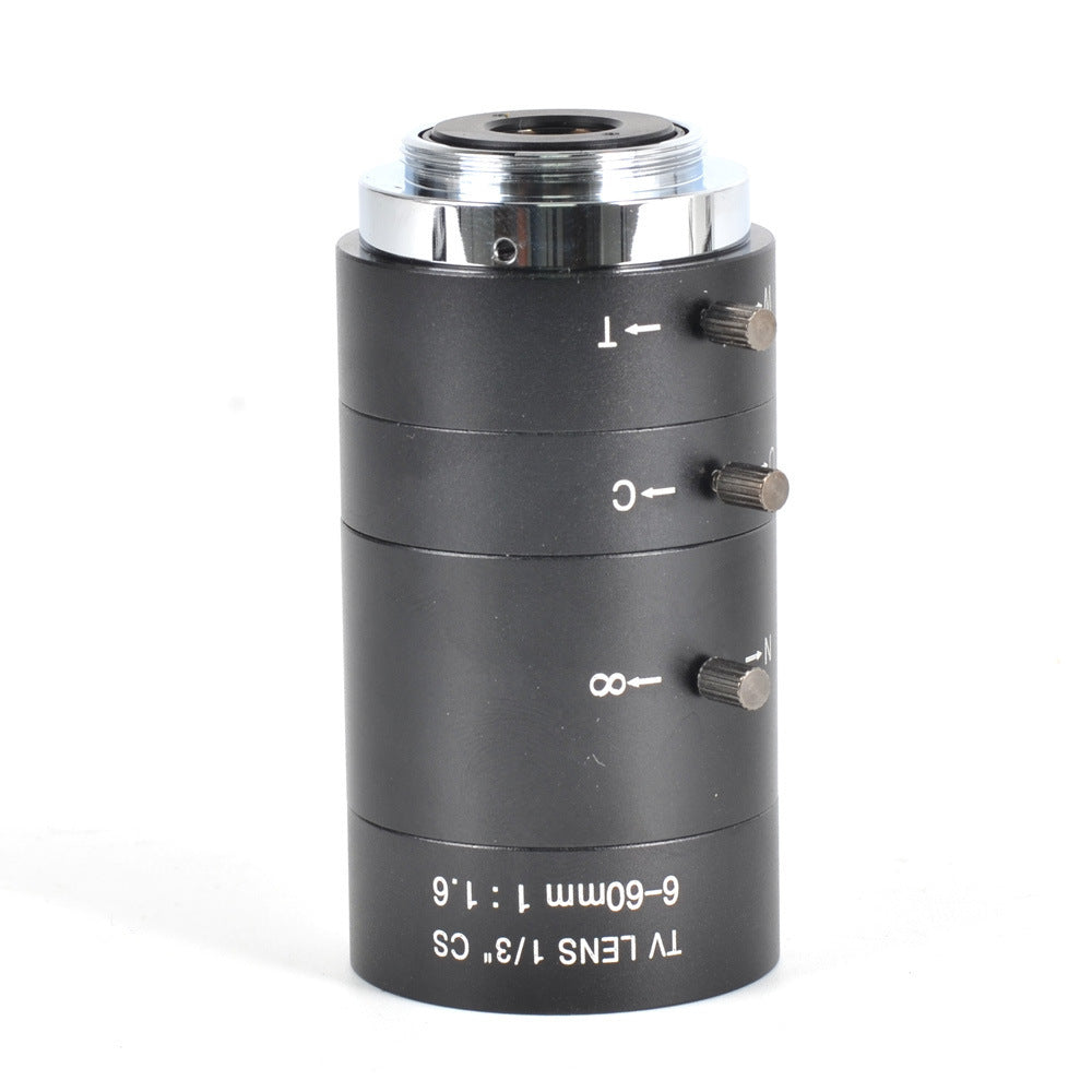 Optical lens with control knobs on a white background