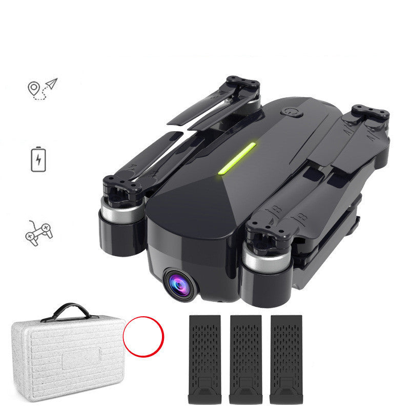 Black drone with front camera, plus carrying case and three dark textured accessory panels