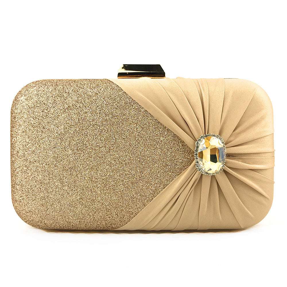 Gold glitter clutch bag with pleated satin side and large oval rhinestone clasp