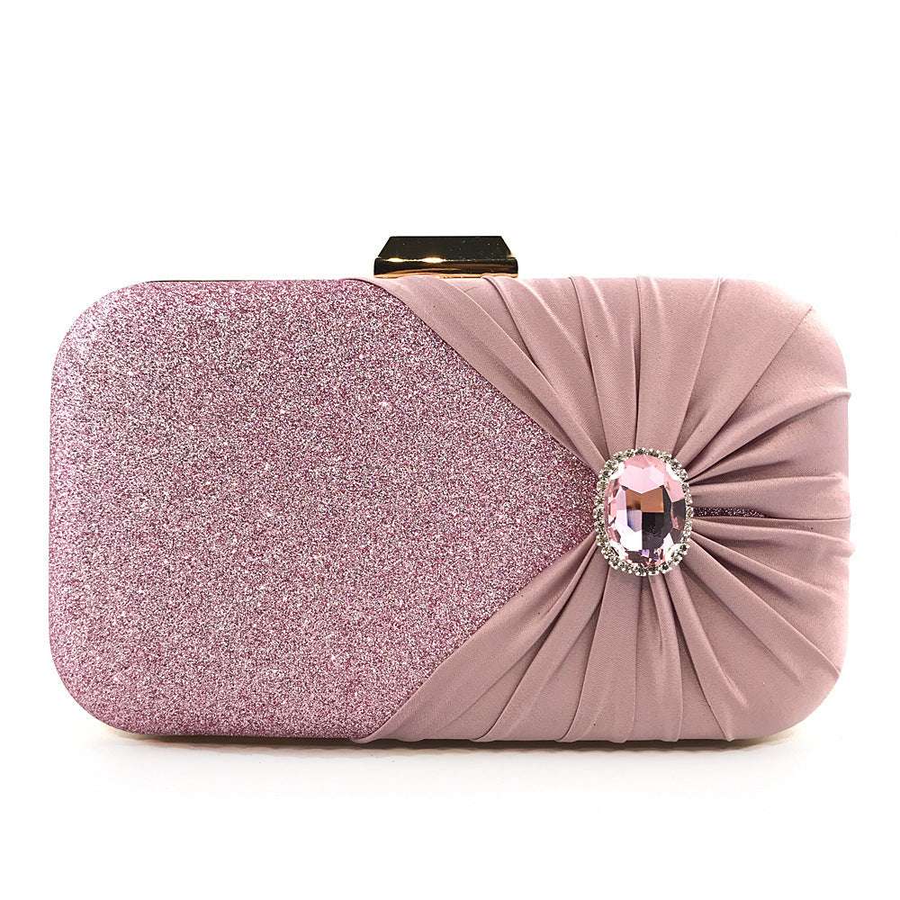 Pink glitter clutch with pleated satin side and oval rhinestone gem clasp