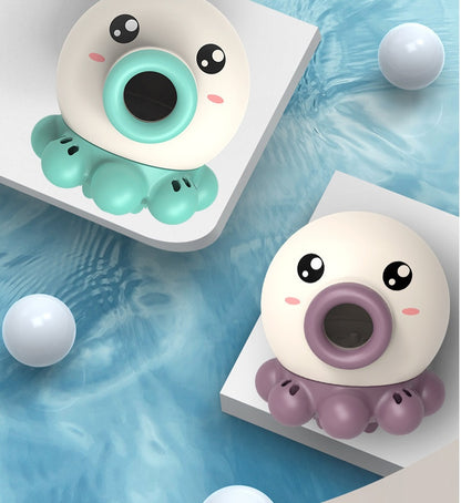 Two cartoonish octopus toys with colorful mouths on a blue textured background.