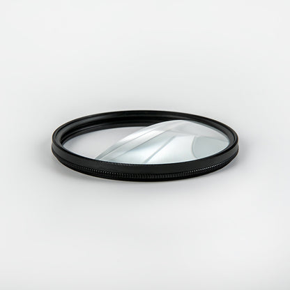 Camera lens filter with black rim on a white background