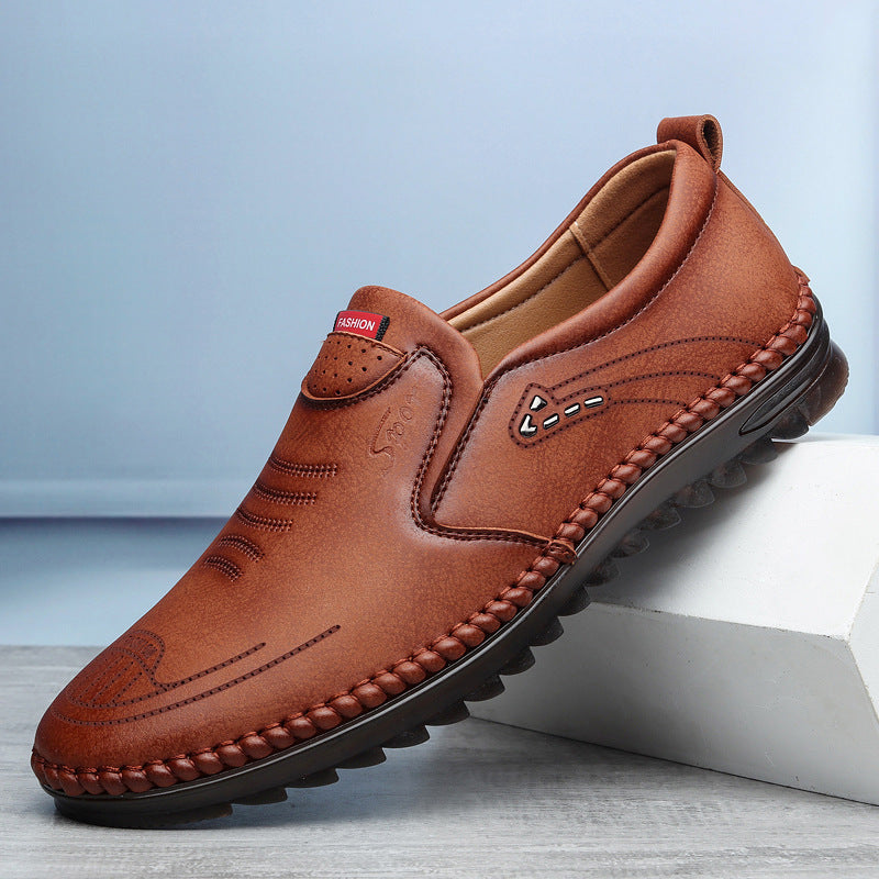 Men's casual slip-on sports shoe, brown leather with side stitching, moc toe, and thick sole