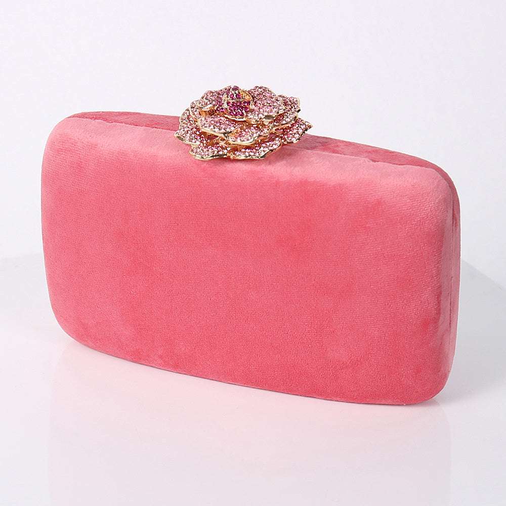 Pink flannel party bag with gold jeweled floral clasp.