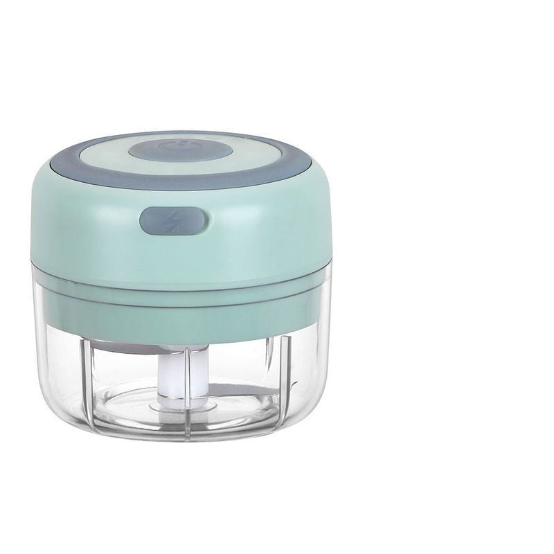 Mini electric garlic chopper with mint lid and clear cup