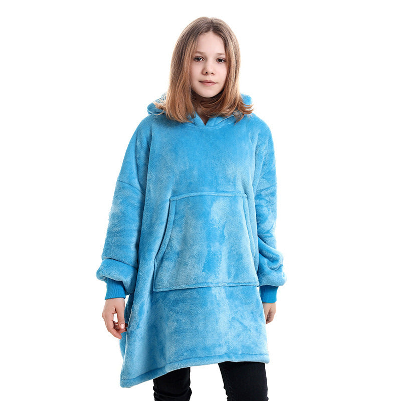 Light blue hooded blanket sweater with front kangaroo pocket and oversized fit