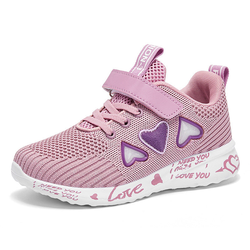 Pink kids' mesh sneakers side view with heart accents, hook-and-loop strap, white sole