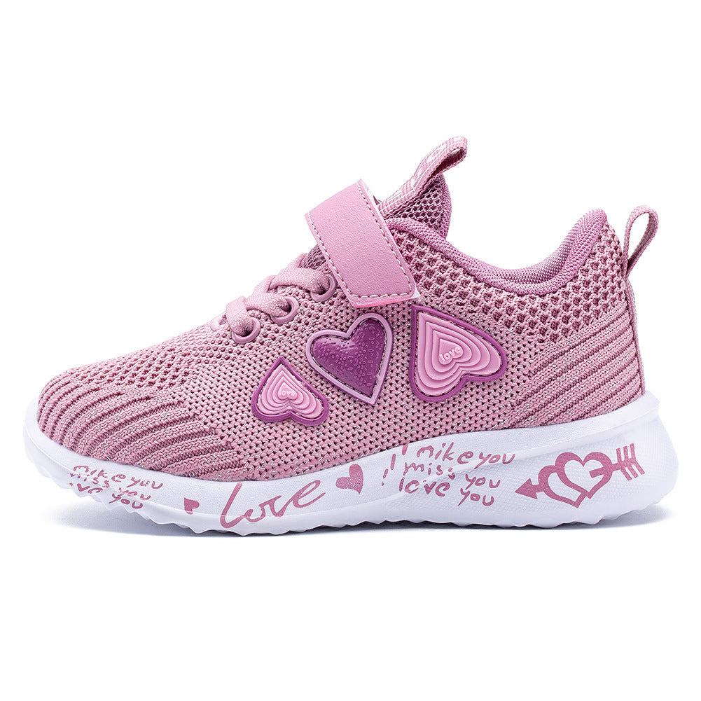 Knit mesh sports shoe with pink knit, pink strap, heart charms, and white love-script sole.