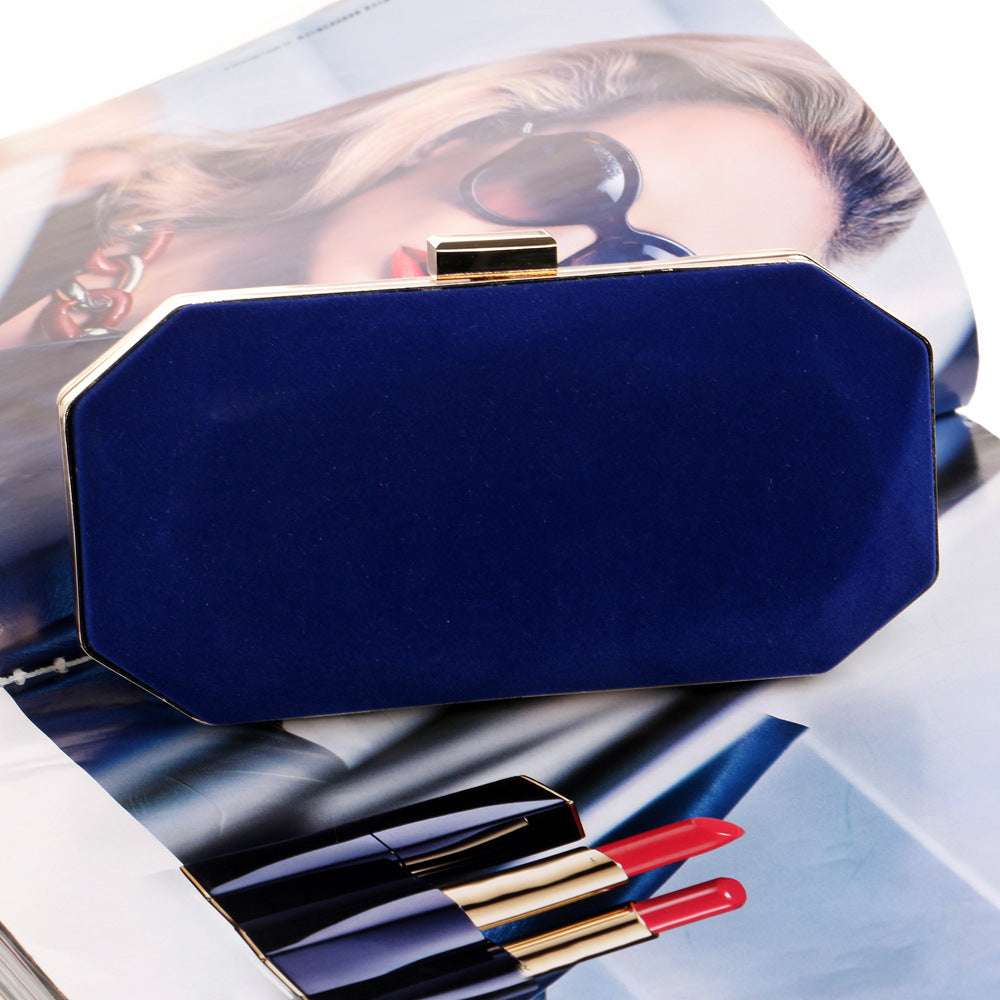 Blue velvet clutch with gold-tone frame clasp, boxy evening bag