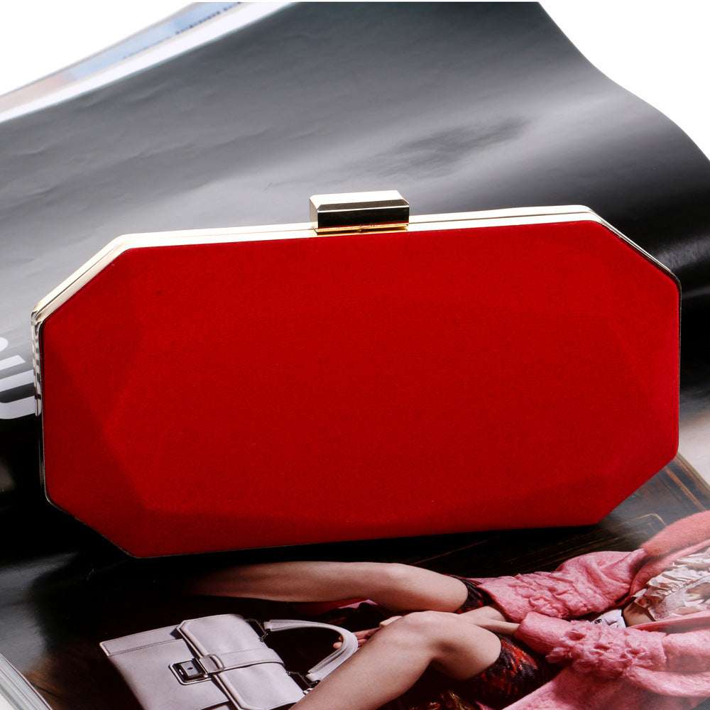 Red velvet clutch with gold-tone frame clasp, boxy evening bag