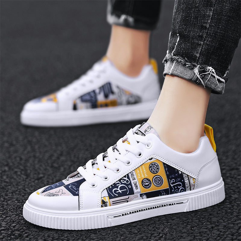 Graffiti canvas sneakers, white low-top with navy collage panel and white laces
