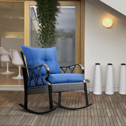 Outdoor wicker rocking chair with blue cushions and black curved rocker base