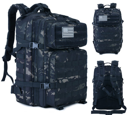 Dark camo tactical backpack with front organizer, multiple straps, and top handle