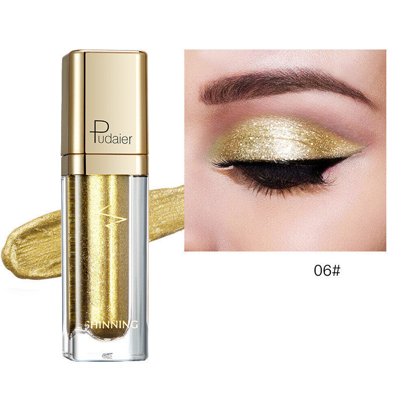 Glitter eyeshadow tube with yellow-gold shimmer; swatch on eyelid, shade 06#