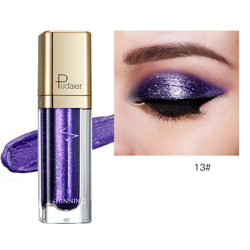 Glitter eyeshadow tube with deep purple shimmer; swatch on eyelid, shade 13#
