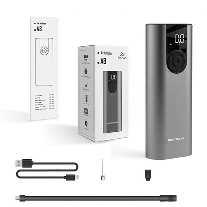 Air inflator with packaging, USB cable, and nozzle on a white background