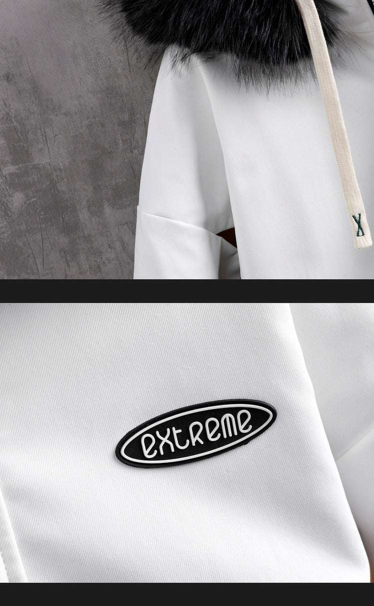 White hoodie with 'EXTREME' patch on a gray background