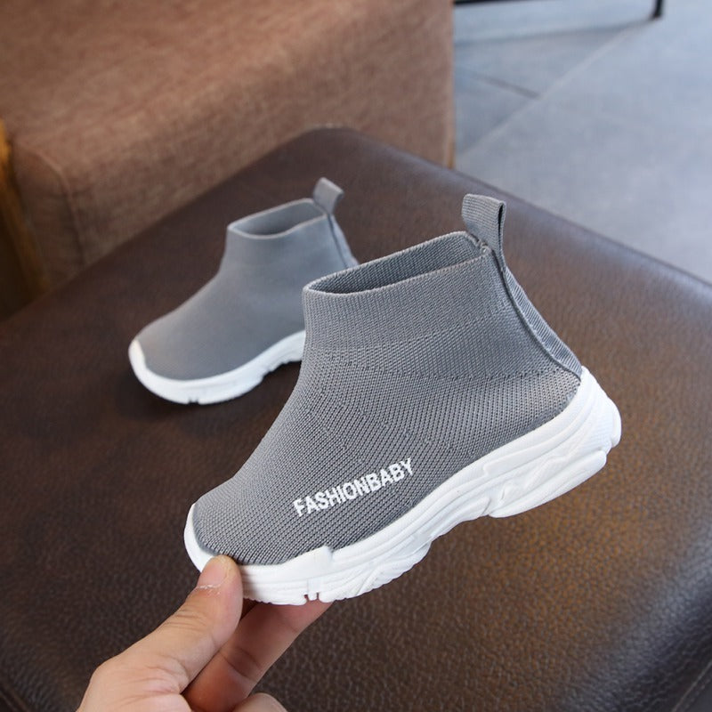 Grey kids slip-on mesh sneaker with white sole and FASHIONBABY logo