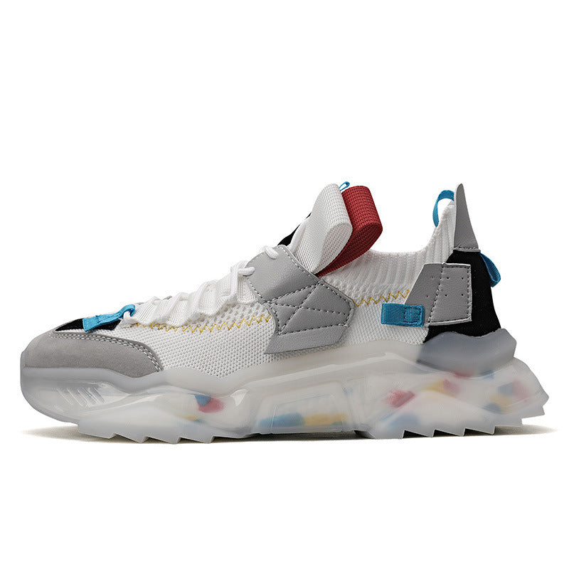 Light gray platform sneaker with black and blue accents and red collar lining, side view