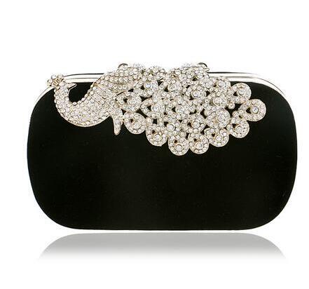 Black velvet clutch bag with silver rhinestone baroque clasp frame