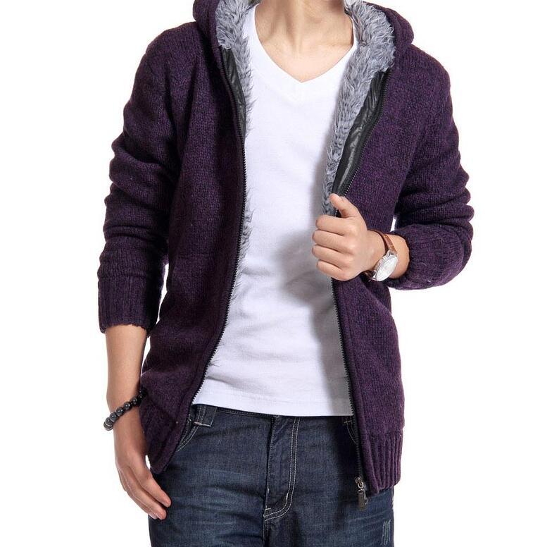 Purple hoodie with gray lining worn over a white shirt and jeans 