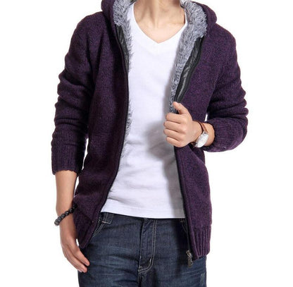 Purple hoodie with gray lining worn over a white shirt and jeans 