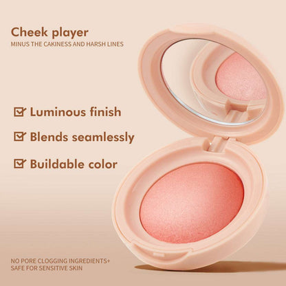 Powder blush compact with rosy shimmer powder, open with mirror lid.