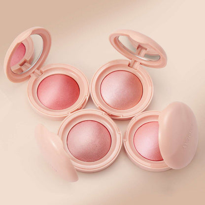 Set of powder blush compacts with pink, rose, and mauve shimmer pans.