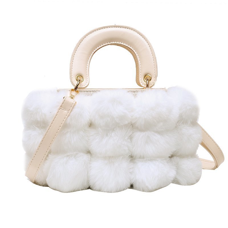 Plush shoulder bag with cream handle and all-white fluffy plush front